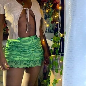 green stretch mini skirt